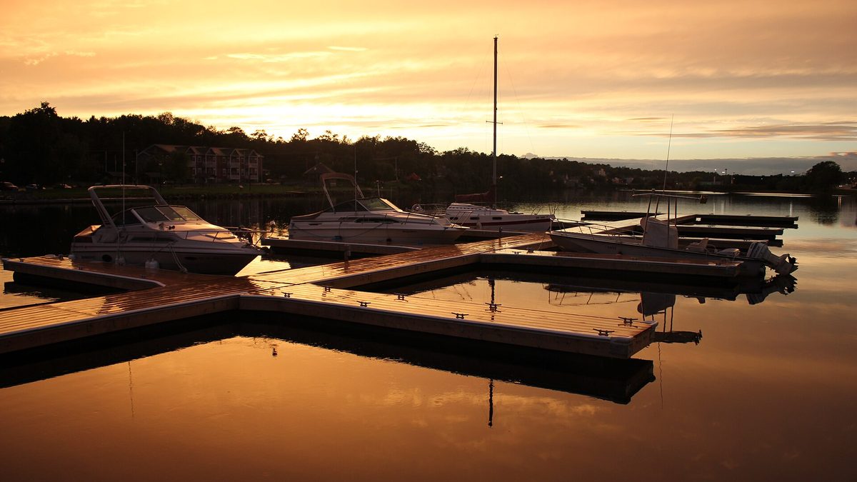 Boats moored at the Bridgewater marina on the LaHave River at sunset
